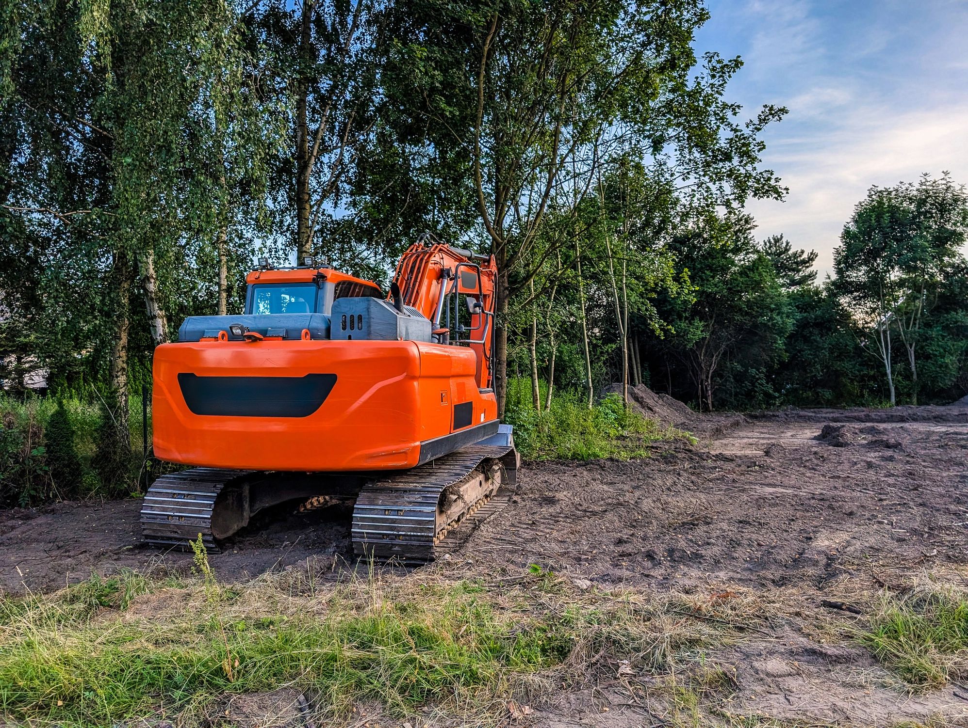 Heavy equipment on a prepared dirt work site